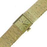 Rolex - Lady's 9ct gold Precision bracelet watch, square dial with bark finish integral bracelet,