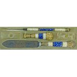 Late 19th Century French gilt metal mounted enamel desk set comprising: paperknife 19cm long, seal