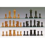 Later 19th/early 20th Century boxwood and ebony Staunton type chess set, height of Kings 11cm, in