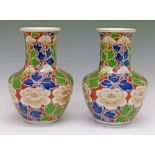 Pair of Arita baluster shaped vases by Fukagawa Seiji, Meiji period, having floral decoration in