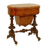 Victorian figured walnut work/games table, the shaped rectangular fold over top opening to reveal