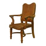 Victorian rustic design elm and ash open arm elbow chair having a thick cut back and shaped seat,