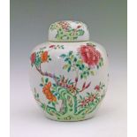 Chinese Famille Rose ovoid jar and cover having typical polychrome foliate decoration on a white