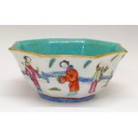 Chinese Famille Rose octagonal bowl having continuous painted decoration depicting figures in a
