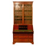 Edwardian inlaid and crossbanded satinwood two section bureau bookcase, the upper section fitted
