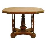 Victorian walnut centre table in the manner of Holland & Sons of London, the octagonal top having