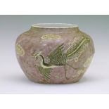 Chinese porcelain squat vase decorated with yellow and black glazed phoenix on a mottled grey
