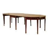 George III inlaid mahogany 'D' end extending dining table, the central section having two flaps, the