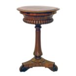 Victorian marquetry inlaid figured walnut teapoy, the circular hinged top opening to reveal a velvet