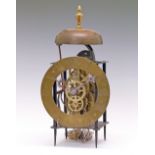 French skeleton style bracket clock, brass dial with Roman numerals, the square frame surmounted