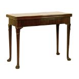 George III mahogany rectangular fold over concertina card table, the tapered pad supports with