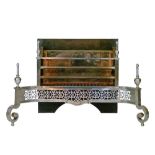 18th Century style polished steel fire basket having a pierced frieze and standing on front scroll