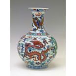 20th Century Chinese baluster shaped vase having polychrome highlighted blue and white decoration