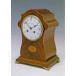 Early 20th Century inlaid mahogany cased mantel clock, the case with shell inlay and standing on