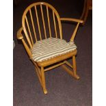 ERCOL BEECH/ASH ROCKING CHAIR WITH MACKERS LABLE EST [£ 30- £ 60]