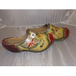 A PAIR OF EARLY WOODEN CLOGS HAND PAINTED UNION JACK & BELGUIM EST [ £10- £20]