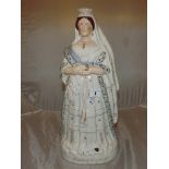 STAFFORDSHIRE FIGURE OF THE QUEEN OF ENGLAND 17 ins TALL EST [£20-£40]