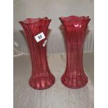 A PAIR OF CRANBERRY GLASS VASES 10 " TALL EST [£10- £20]