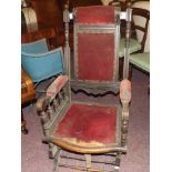 AN EDWARDIAN ROCKING CHAIR EST [£ 40- £60]