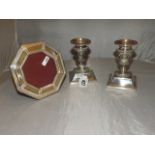 PAIR OF SILVER PLATED CANDLE STICKS 4 1/2 " HIGH & SILVER PHOTO FRAME EST[£20-£40]