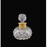 A French crystal and gilt-bronze profume bottle late 19th century h. 11,5 cm.