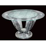 A particular French table 20th century 75x131 cm. after a model of Lalique of 1952, circular crystal