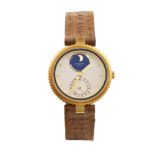 A Gerald Genta Safar lady's Moon Phase day-date wristwatch   18K gold and circular-case of a