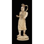 An ivory sculpture Oriental manufacture h. 29 cm. modelled as a Samurai, minor defects