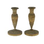 A pair of gilt-bronze candelabra antique manufacture, early 20th century h. 17,5 cm. fluted stand,