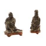 A lot of two Chinese bronze sculptures Qing dinasty h. 8,5 cm. - 9,5 cm. modelled as two divinities,