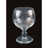 A Bohemian crystal glass period Biedermeier h. 20 cm. decorated with floral engravings