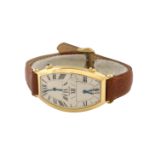 A Cartier Tonneau Dual Time wristwatch 1960/70s  18K gold tonneau watchcase of 39x26 mm., ref. 309 -