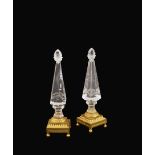 A pair of French rock crystal and gilt bronze obelisks 19th century h. 24 cm. plinth-shaped bases