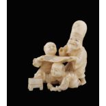 A small ivory sculpture Oriental manufacture, 19th century h. 7 cm. modelled like an old man with