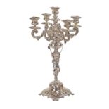 A French silver five-branch candelabra 1850 - 1870 peso 2400 gr. on circular base standing on four