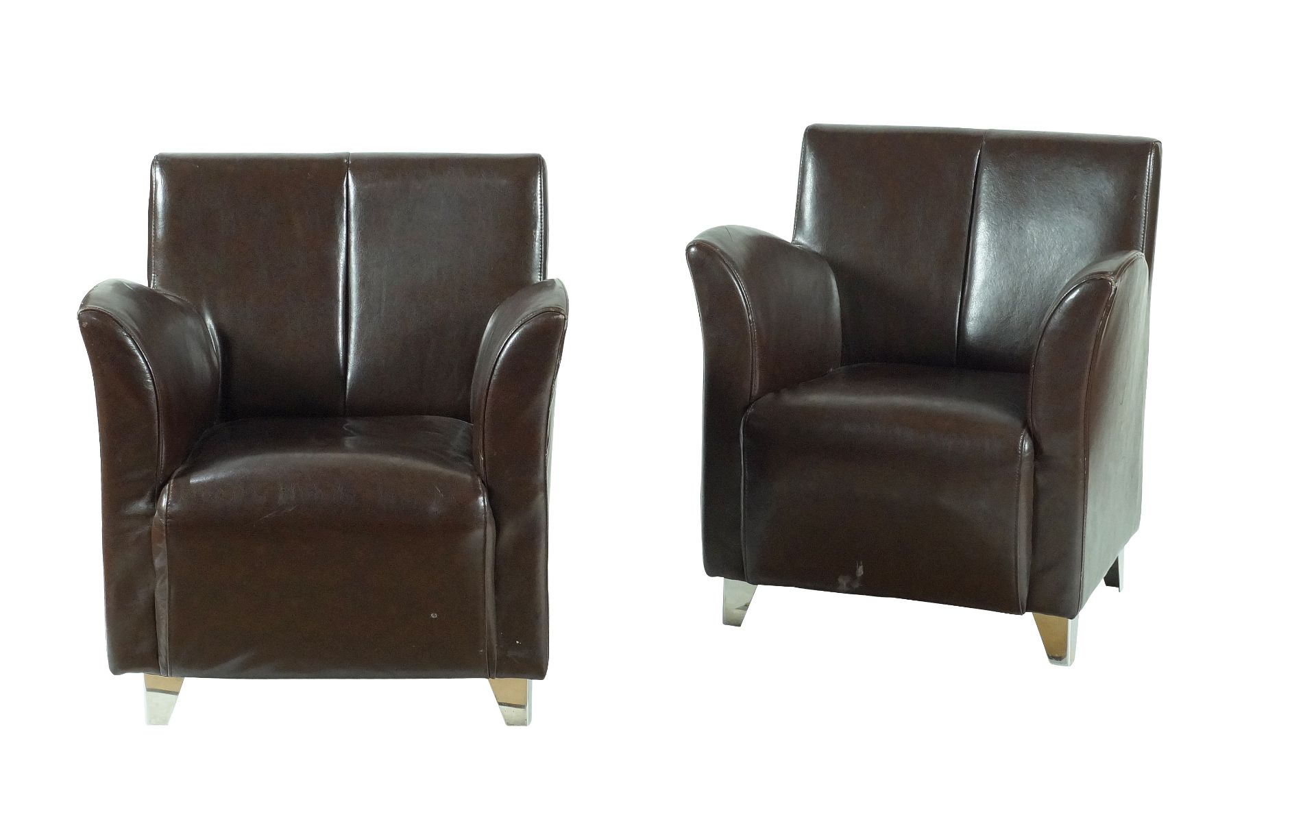 A pair of leather armchairs