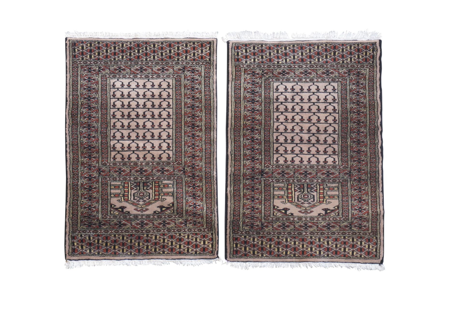 A pair of prayer rugs