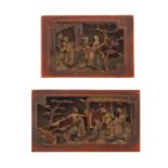 A pair of Chinese lacquered wood panels