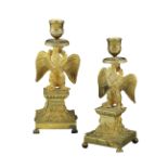 A pair of English gilt-bronze candelabra