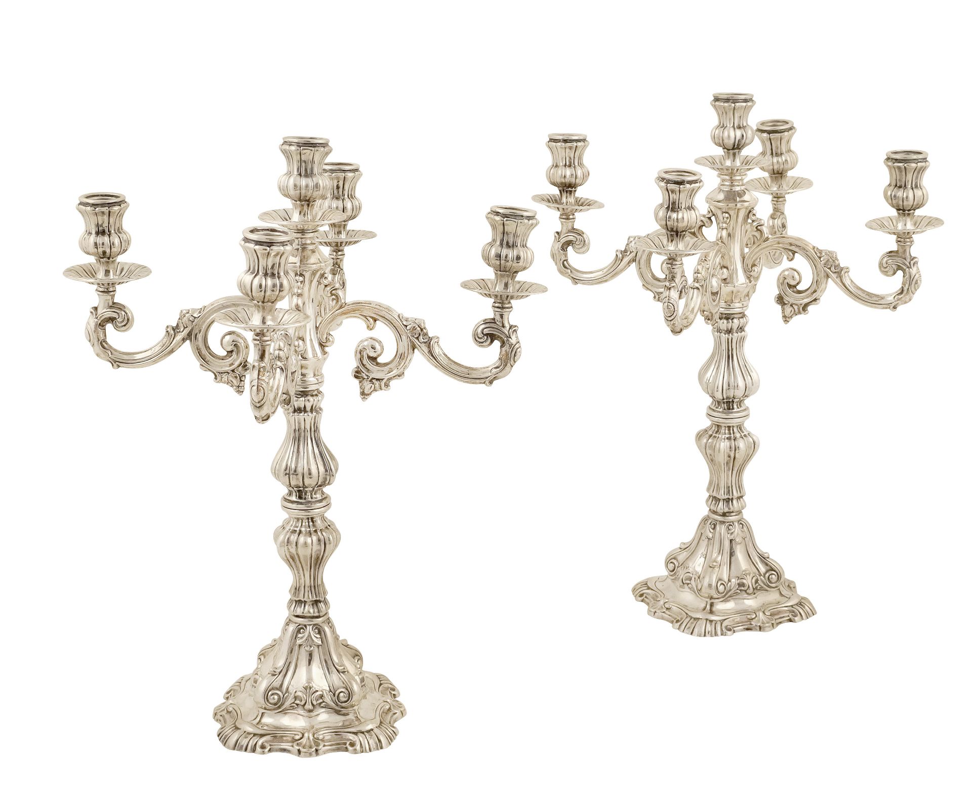 A pair of Italian silver five branched candelabra