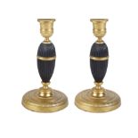 A pair of gilt-bronze candlesticks