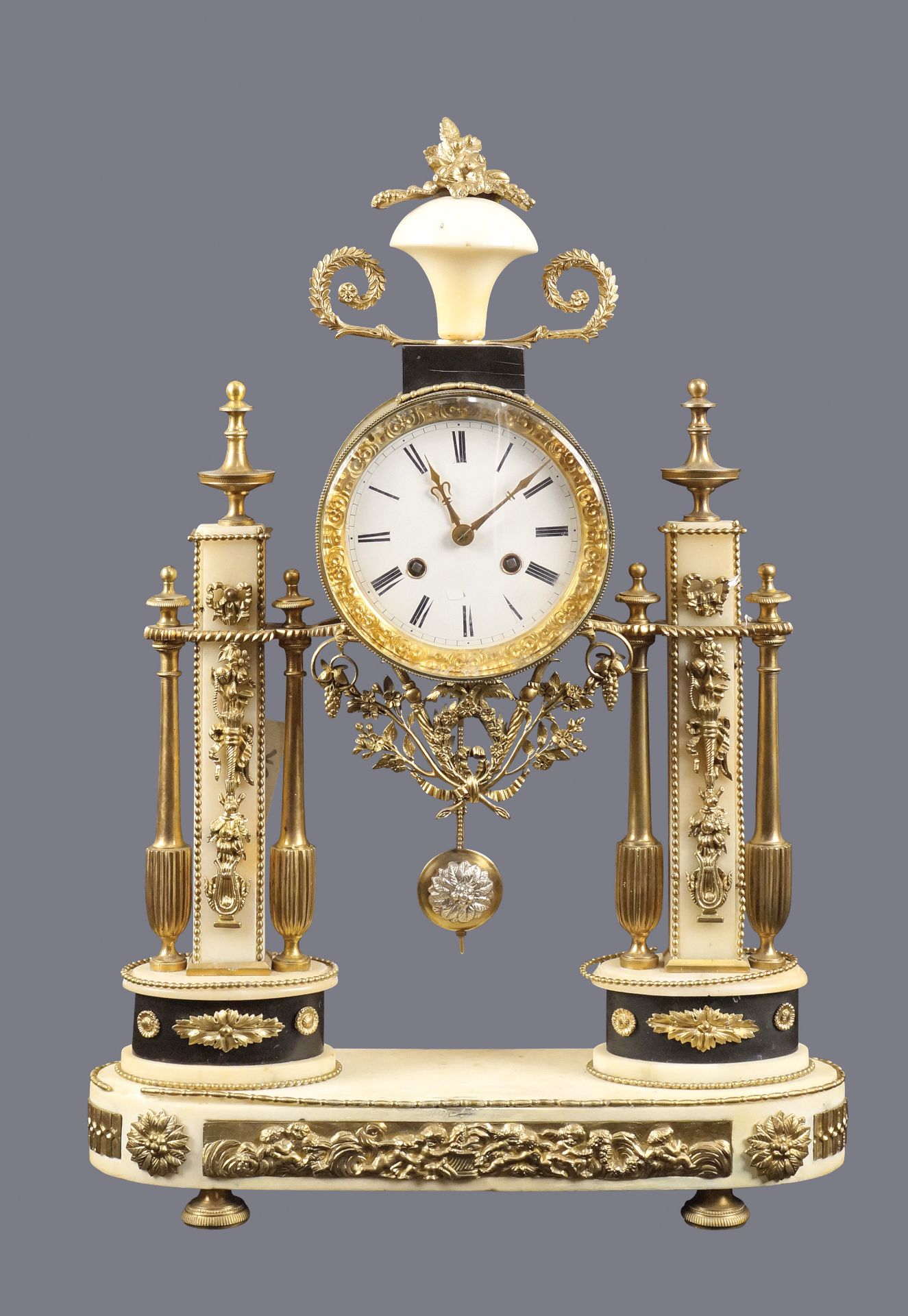 A French gilt-bronze and marble table clock