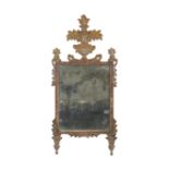 A gilt and chased wood mirror 18th century 126x60 cm.