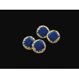 A pair of 14kt gold and enamel Liberty cufflinks peso 14,1 gr.