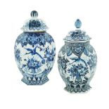 A pair of majolica potiches in the style of Delft, late 19th century h. 38 cm.