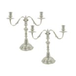 A pair of two-branched silver candelabra Rome, 18th century peso 1475 gr.