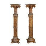 A pair of walnut and durmast columns late 19th century h. 135 cm.