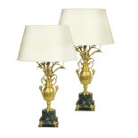 A pair of French gilt-bronze lamps 20th century h. 94 cm.