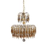 A gilt metal chandelier with refined crystal pendants early 20th century 54x48 cm.