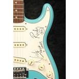 Kaiser Chiefs: a guitar autographed by Ricky Wilson and Nick Baines, a Stratocaster style guitar
